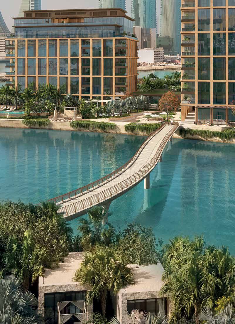 The private bridge to the Four Seasons hotel over turquoise water