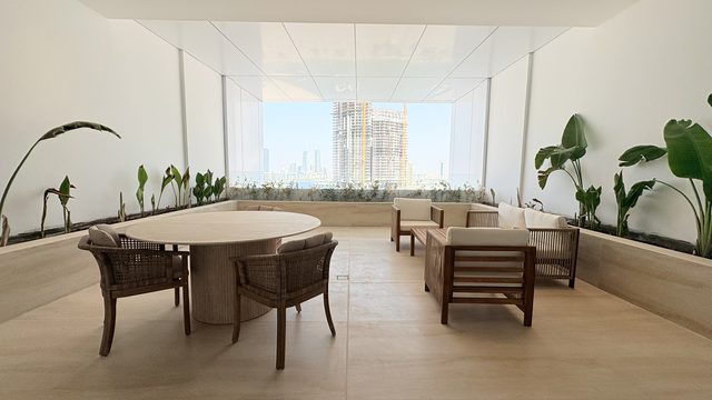 One-Bedroom Apartment with Private Garden and Water View