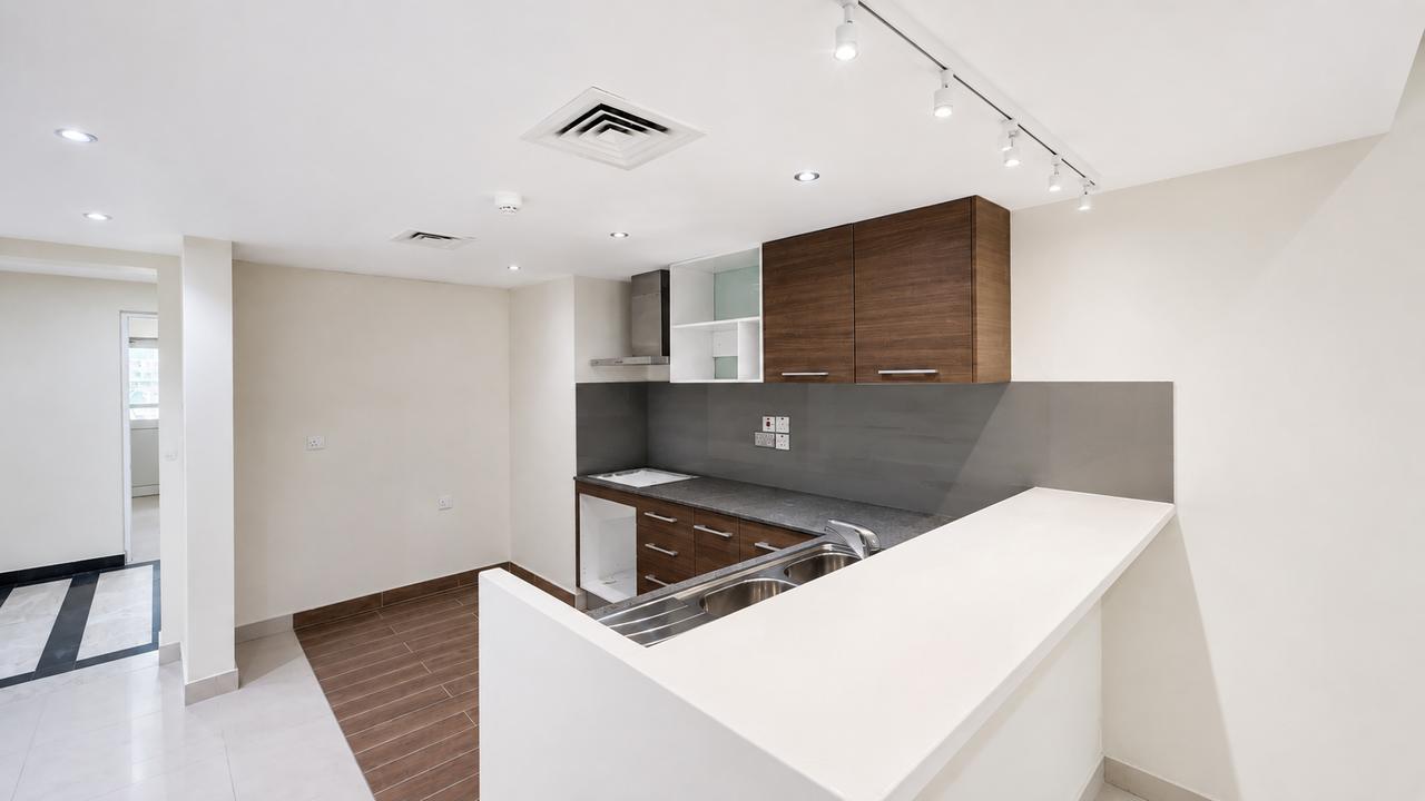 Two-Bedroom Semi-Furnished Apartment with Parking