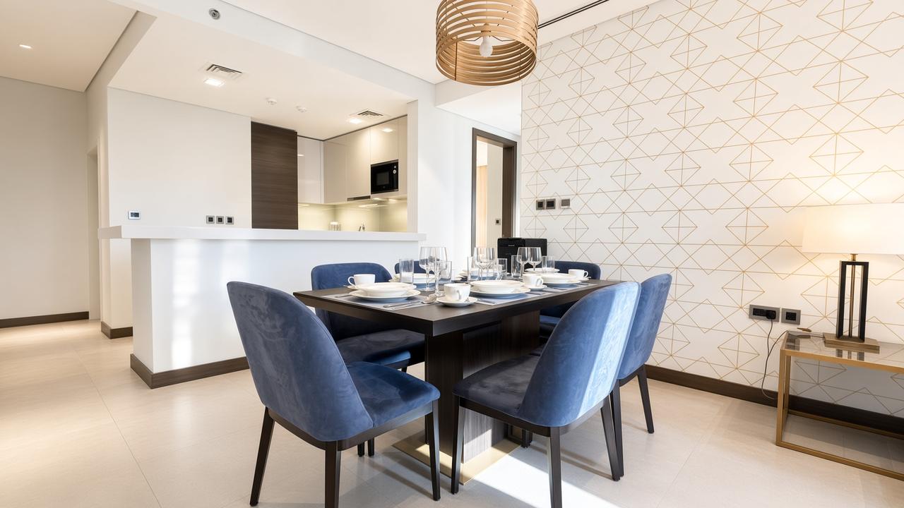 Three-Bedroom Apartment with Maid's Room