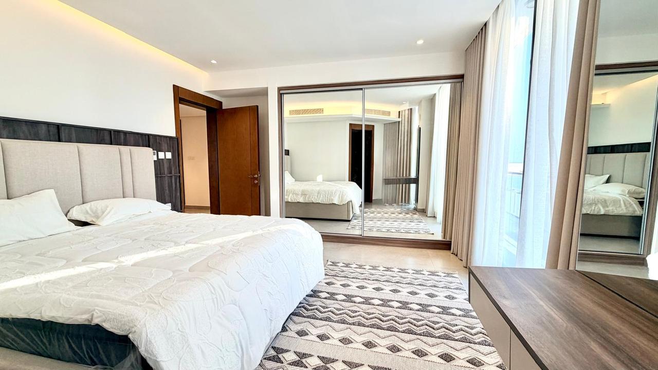 Three-Bedroom Apartment with Water Views and Maids Room