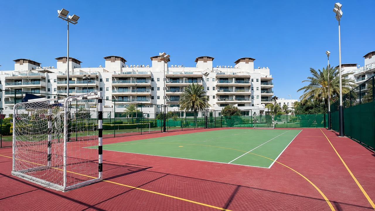 Two-Bedroom Apartment with Private Garden and Pool