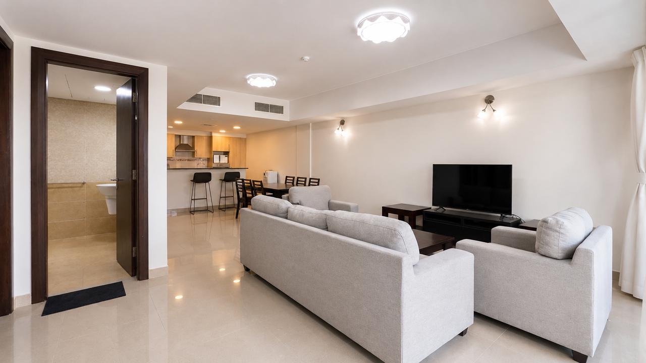 Two-Bedroom Apartment with Private Garden and Pool