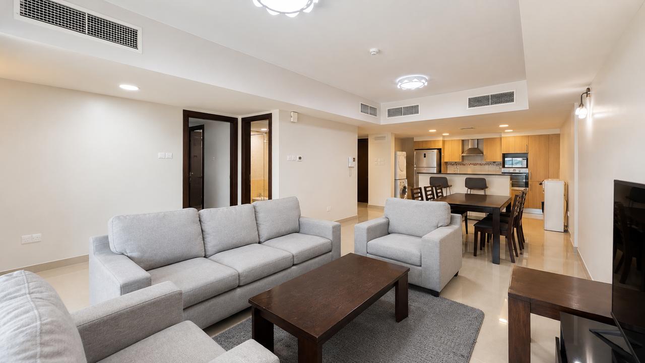 Two-Bedroom Apartment with Private Garden and Pool
