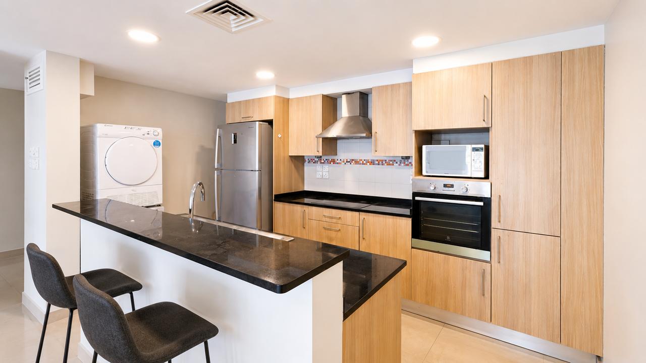 Two-Bedroom Apartment with Private Garden and Pool
