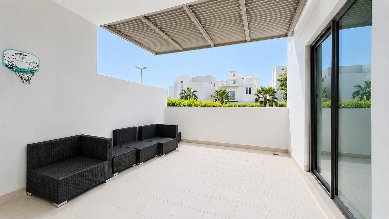 Two-Bedroom Apartment with Private Garden and Pool