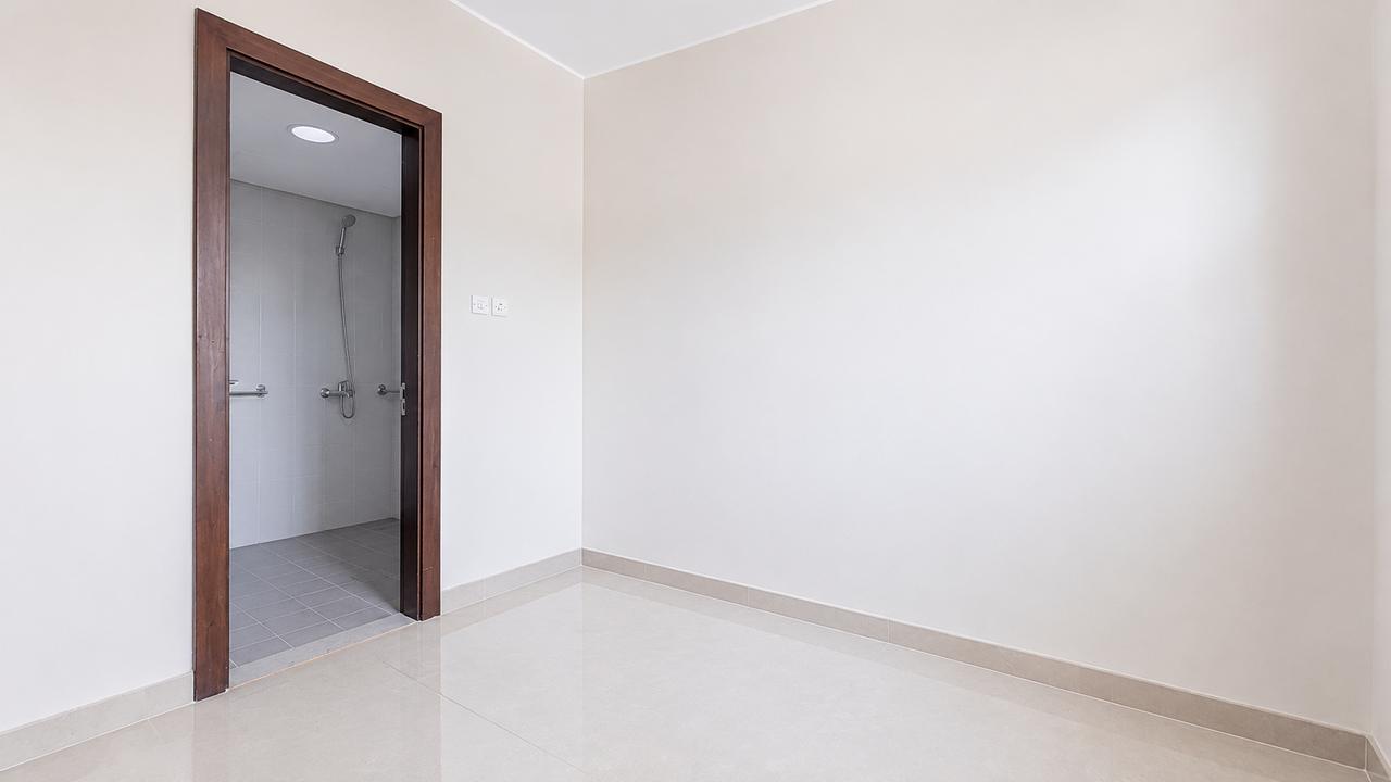Three-Bedroom Apartment with Maid's Room and Garden