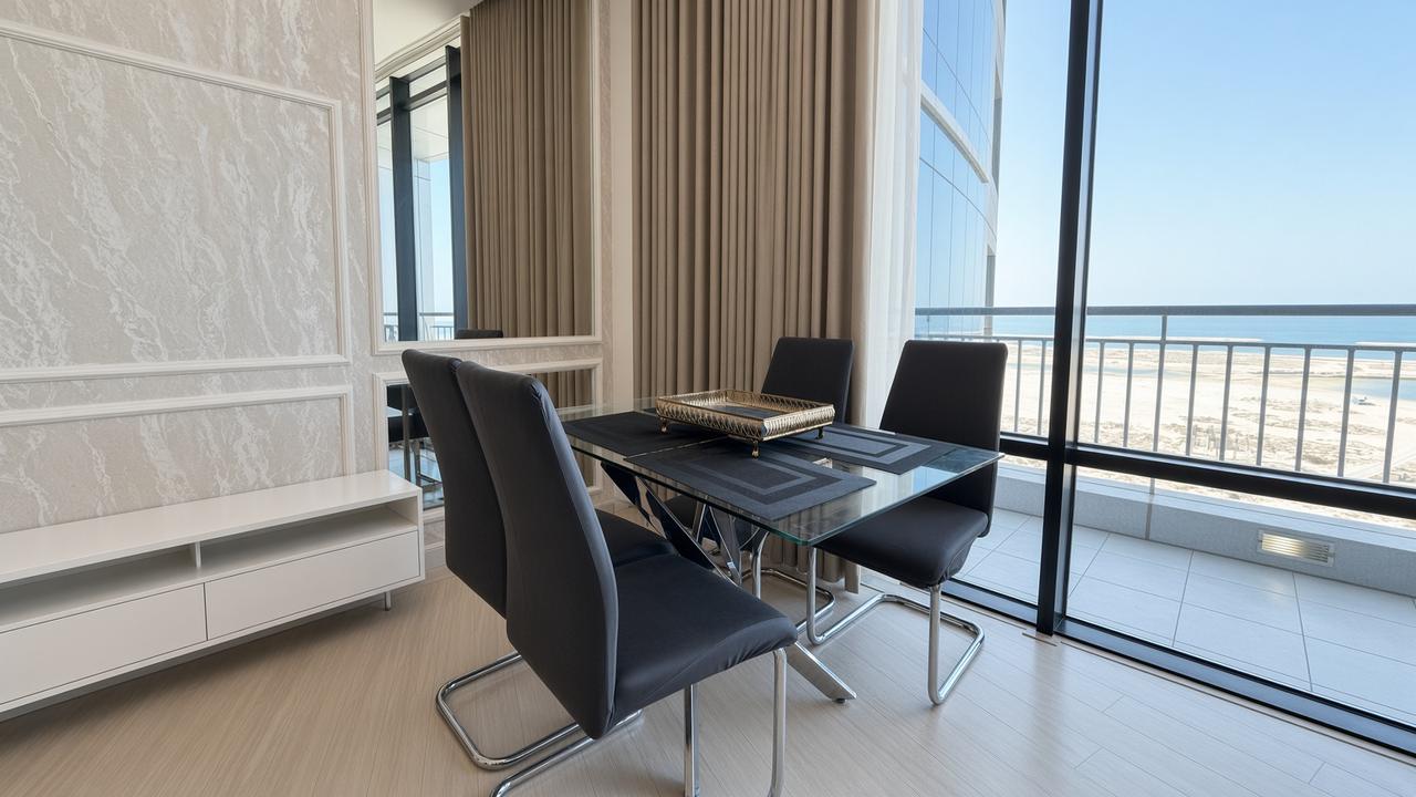 One-Bedroom Apartment with Water Views and Gym