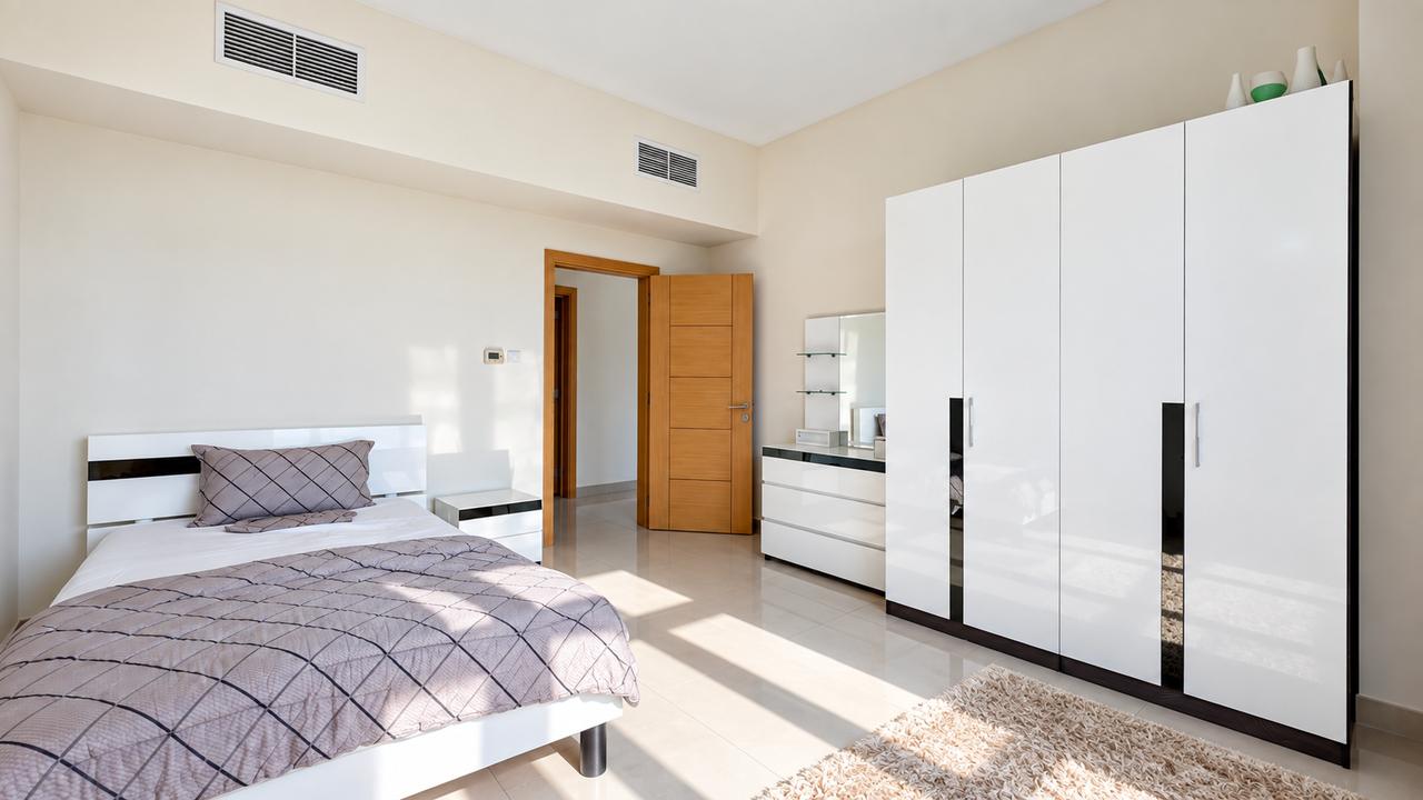 2-Bedroom Apartment with Pool and Gym Access