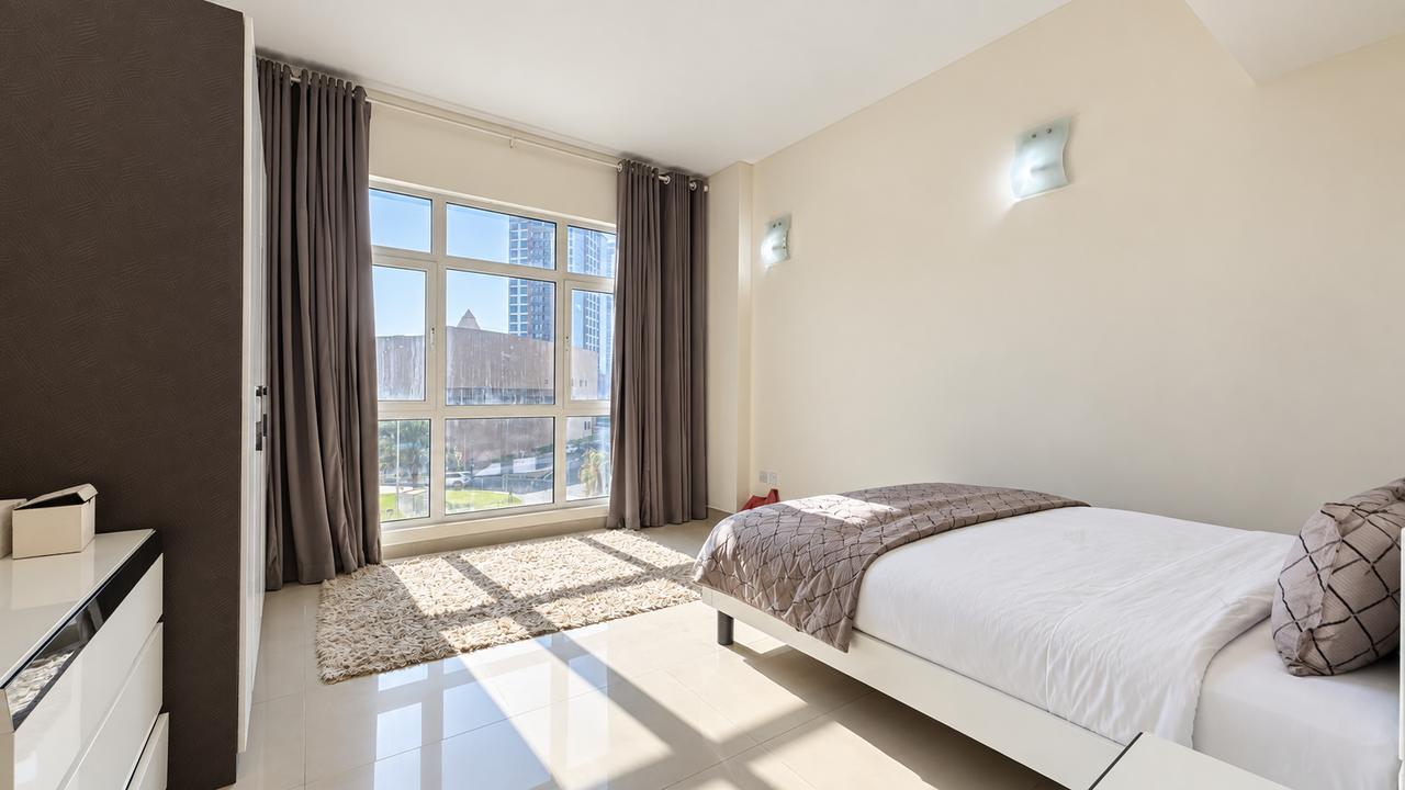 2-Bedroom Apartment with Pool and Gym Access
