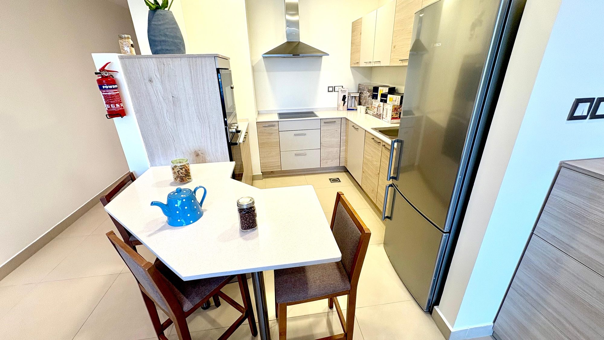 Three-Bedroom Apartment with Private Balcony and Pool