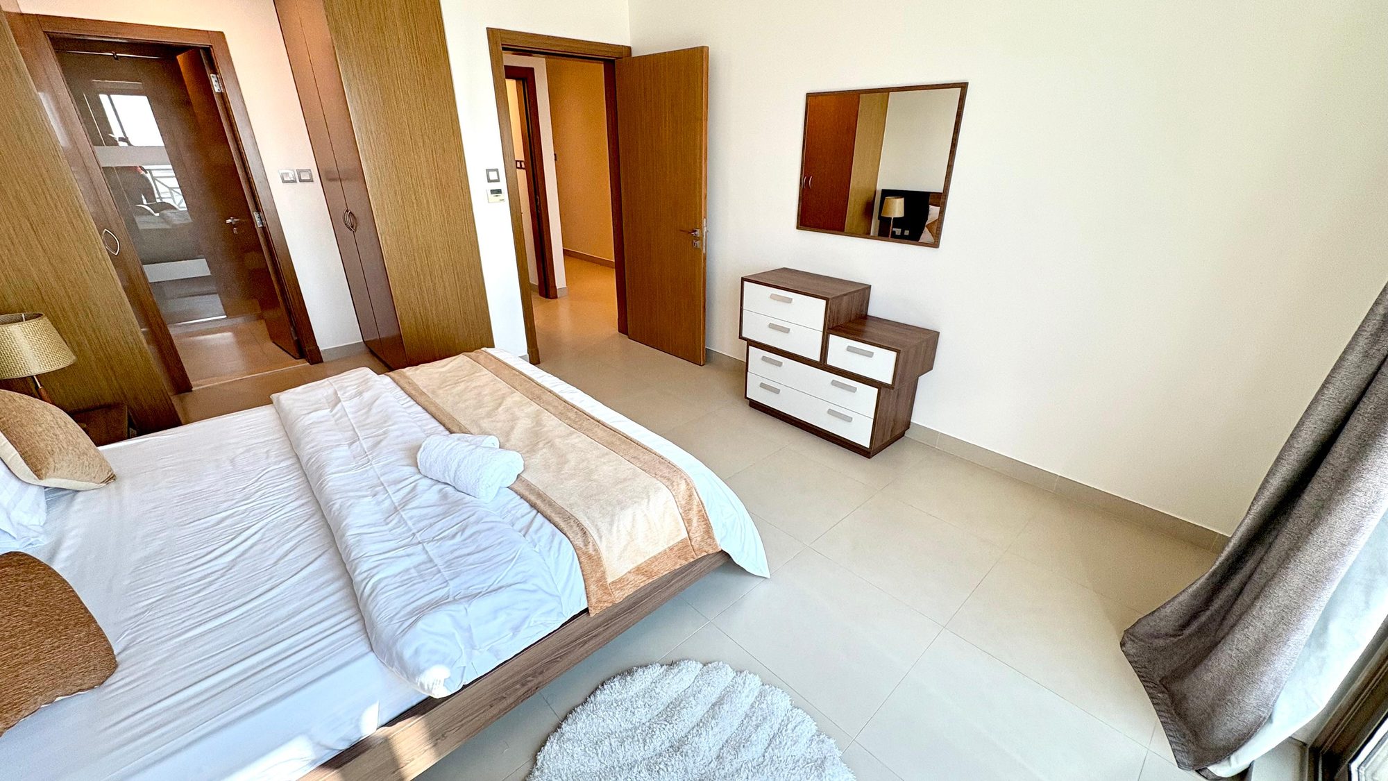 Three-Bedroom Apartment with Private Balcony and Pool