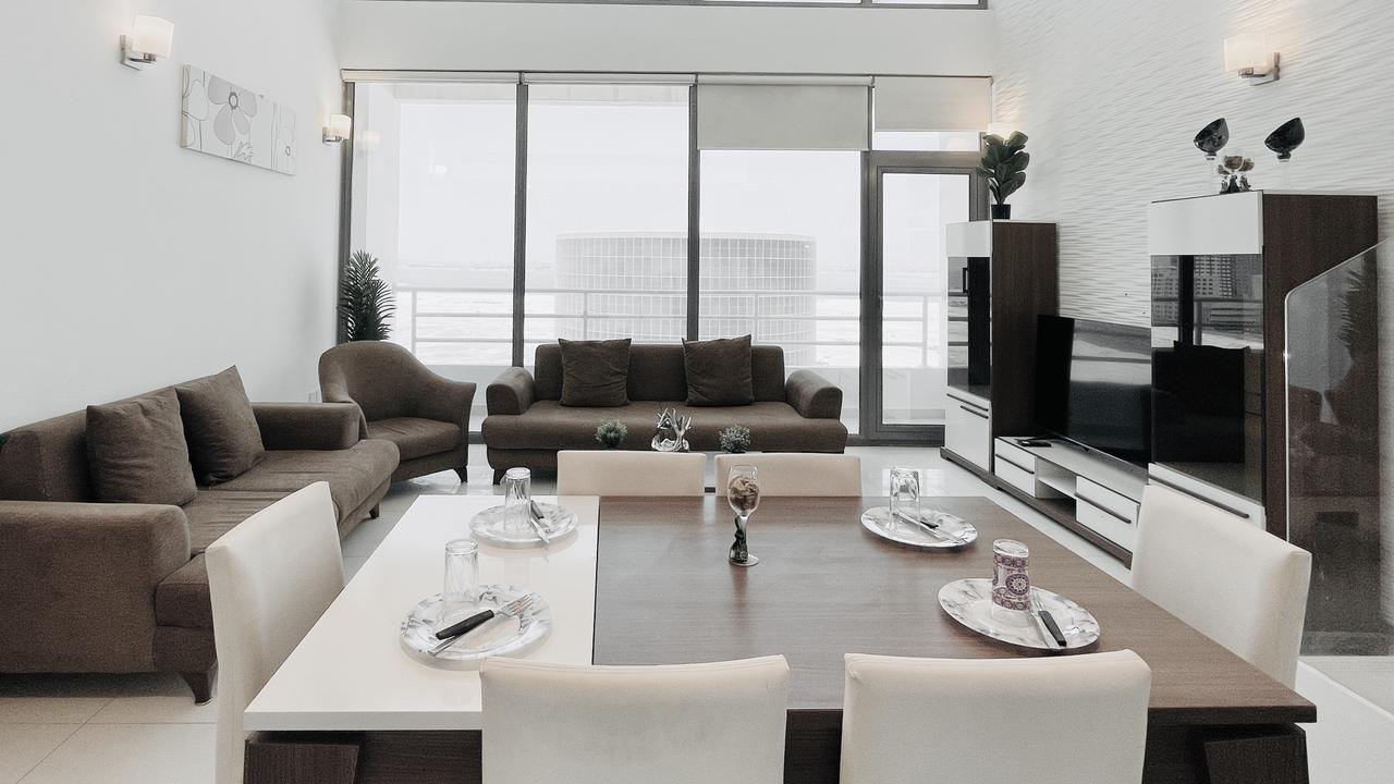 Three-Bedroom Apartment with Balcony and Pool Access