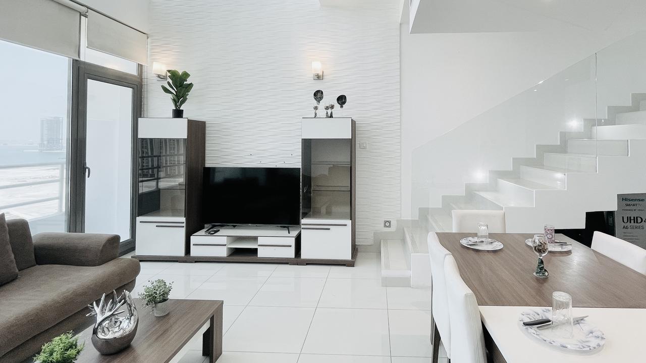 Three-Bedroom Apartment with Balcony and Pool Access