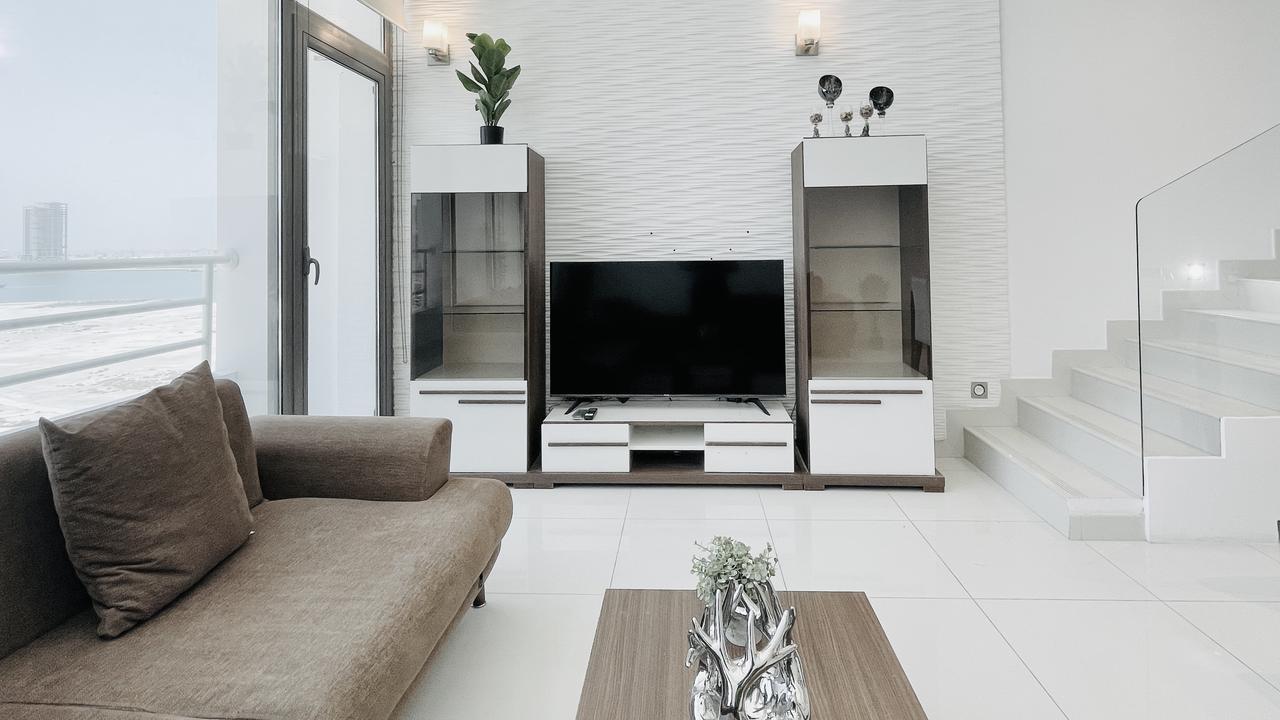 Three-Bedroom Apartment with Balcony and Pool Access