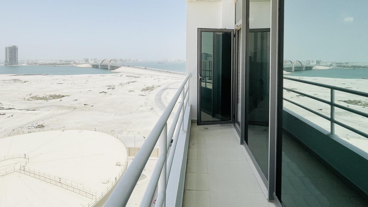 Three-Bedroom Apartment with Balcony and Pool Access