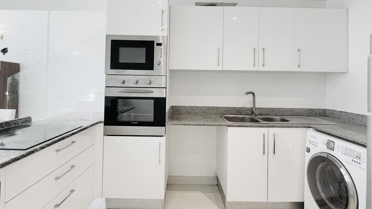 Three-Bedroom Apartment with Balcony and Pool Access