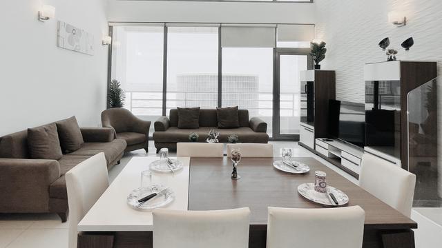 Three-Bedroom Apartment with Balcony and Pool Access