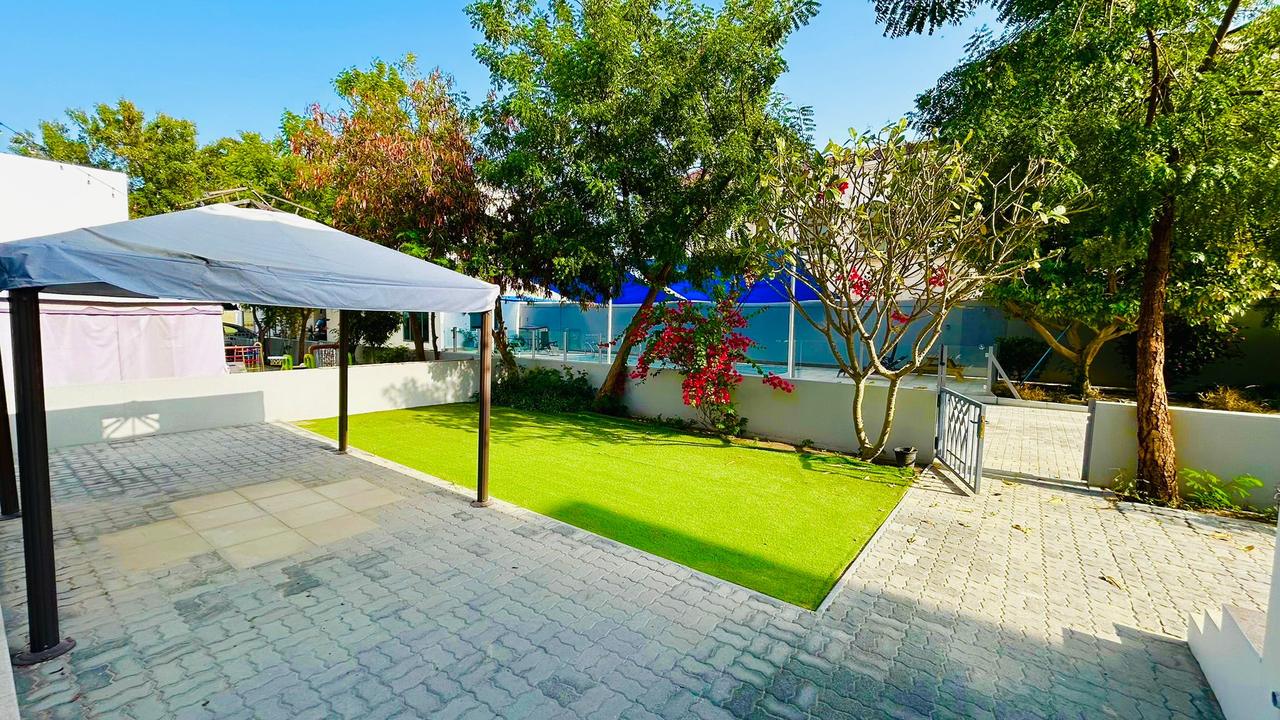 Four-Bedroom Villa with Shared Pool Access