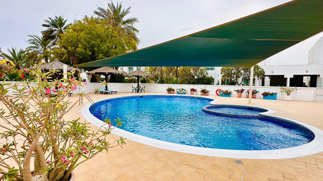 Four-Bedroom Villa with Private Garden and Pool Access
