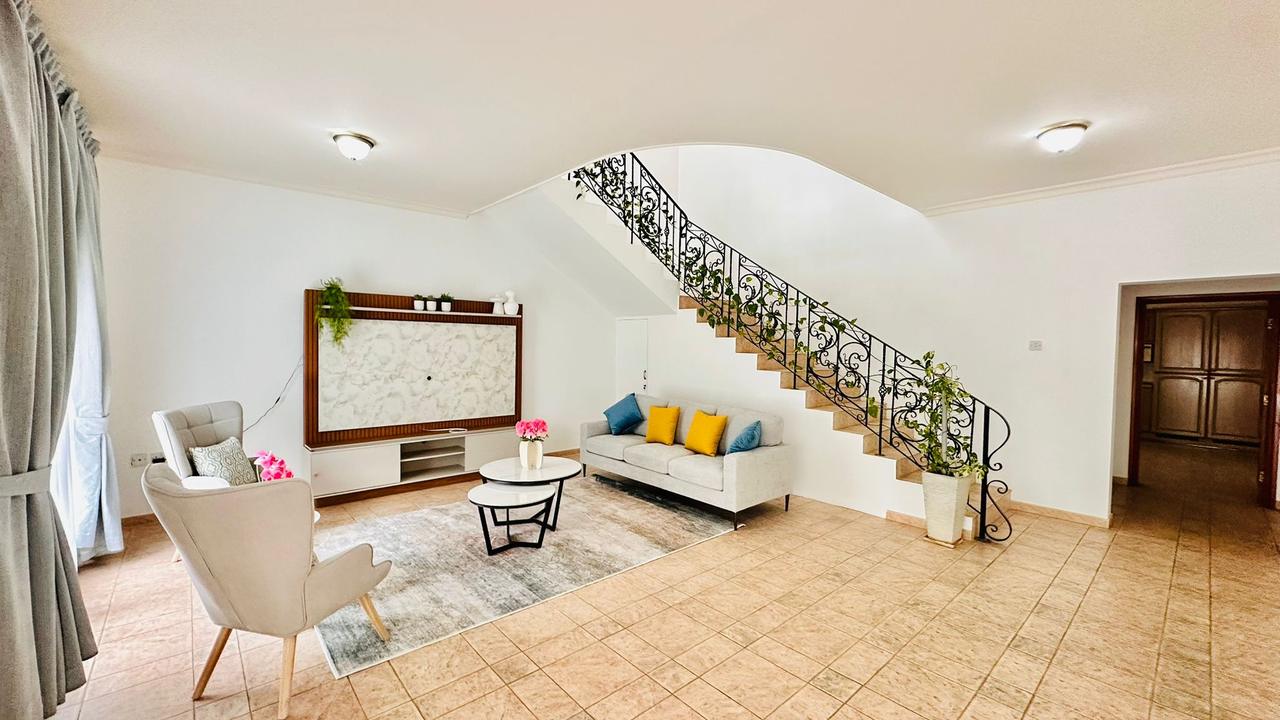 Four-Bedroom Villa with Private Garden and Pool Access
