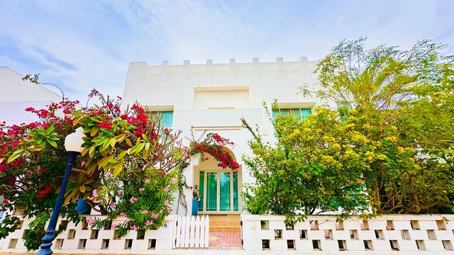 Four-Bedroom Villa with Private Garden and Pool Access