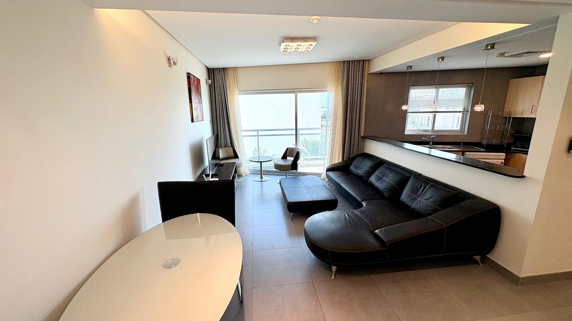One-Bedroom Apartment with Balcony and Pool