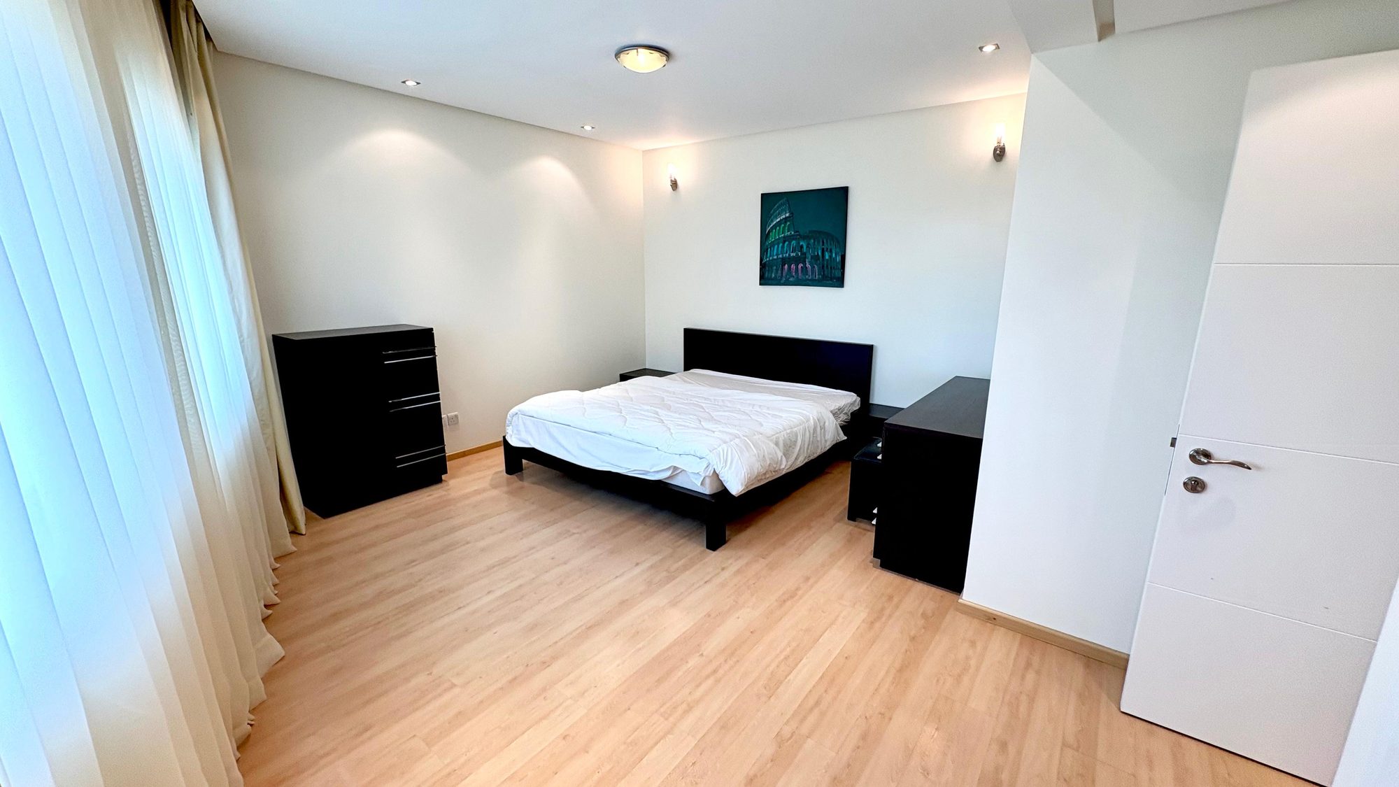 One-Bedroom Apartment with Balcony and Pool