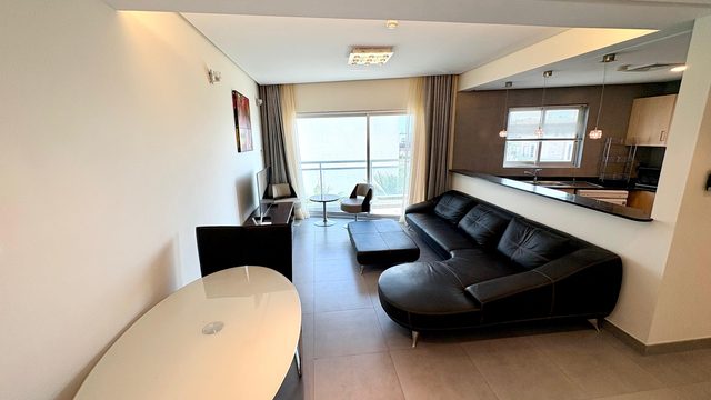 One-Bedroom Apartment with Balcony and Pool