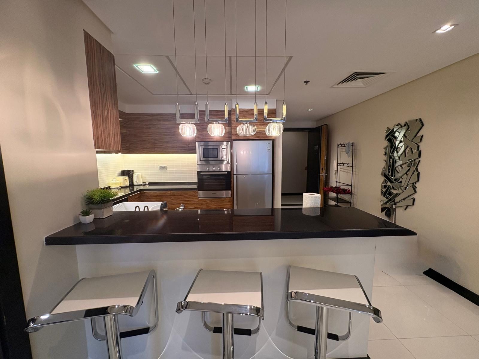 One Bedroom Apartment with Balcony and Water View