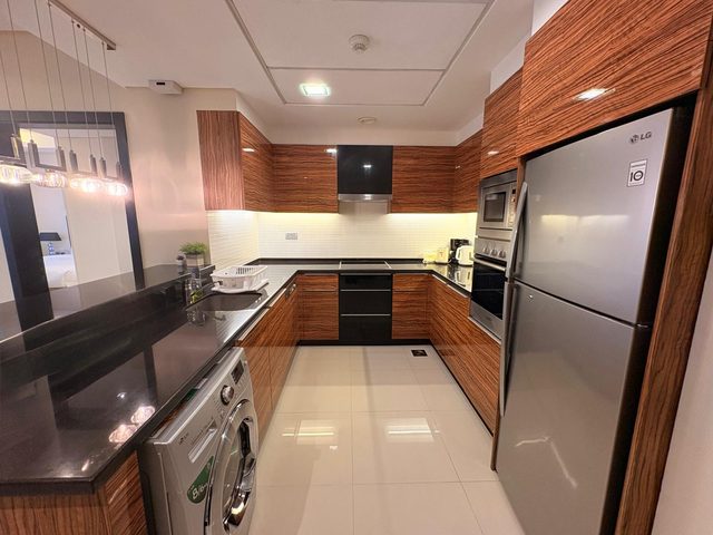 One Bedroom Apartment with Balcony and Water View