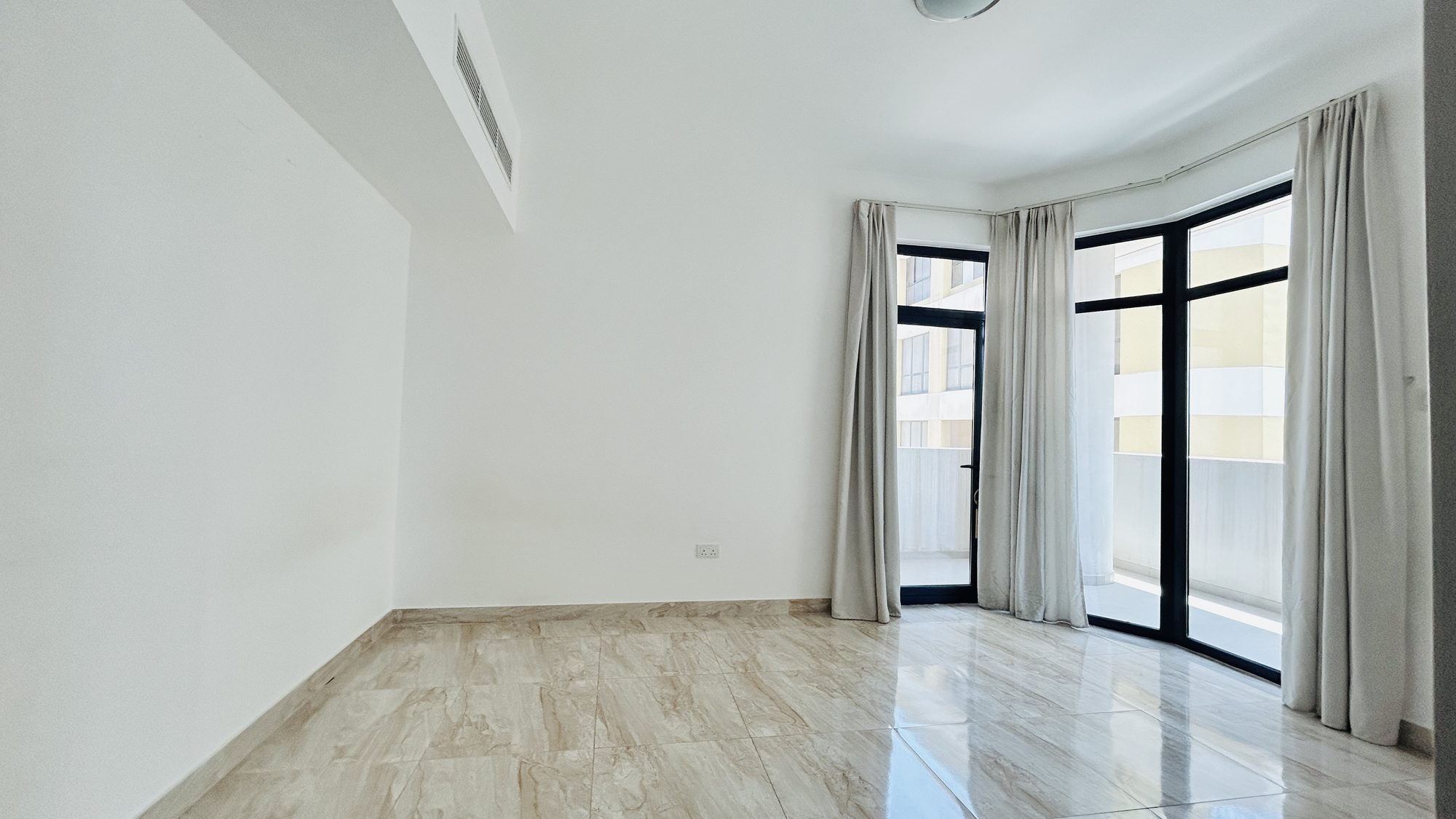 Two Bedroom Semi-Furnished Apartment with Balcony