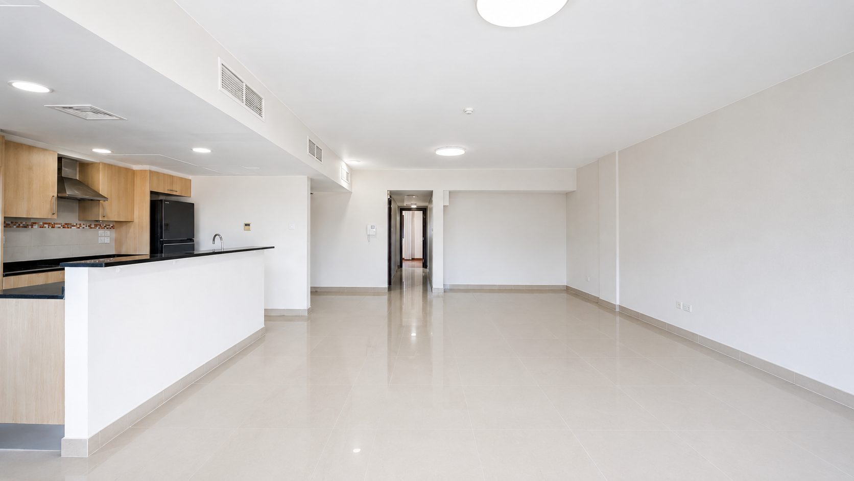 Three-Bedroom Apartment with Private Garden and Pool