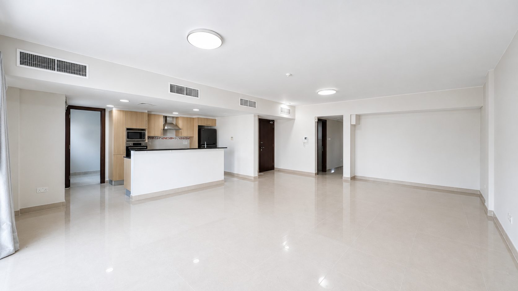 Three-Bedroom Apartment with Private Garden and Pool
