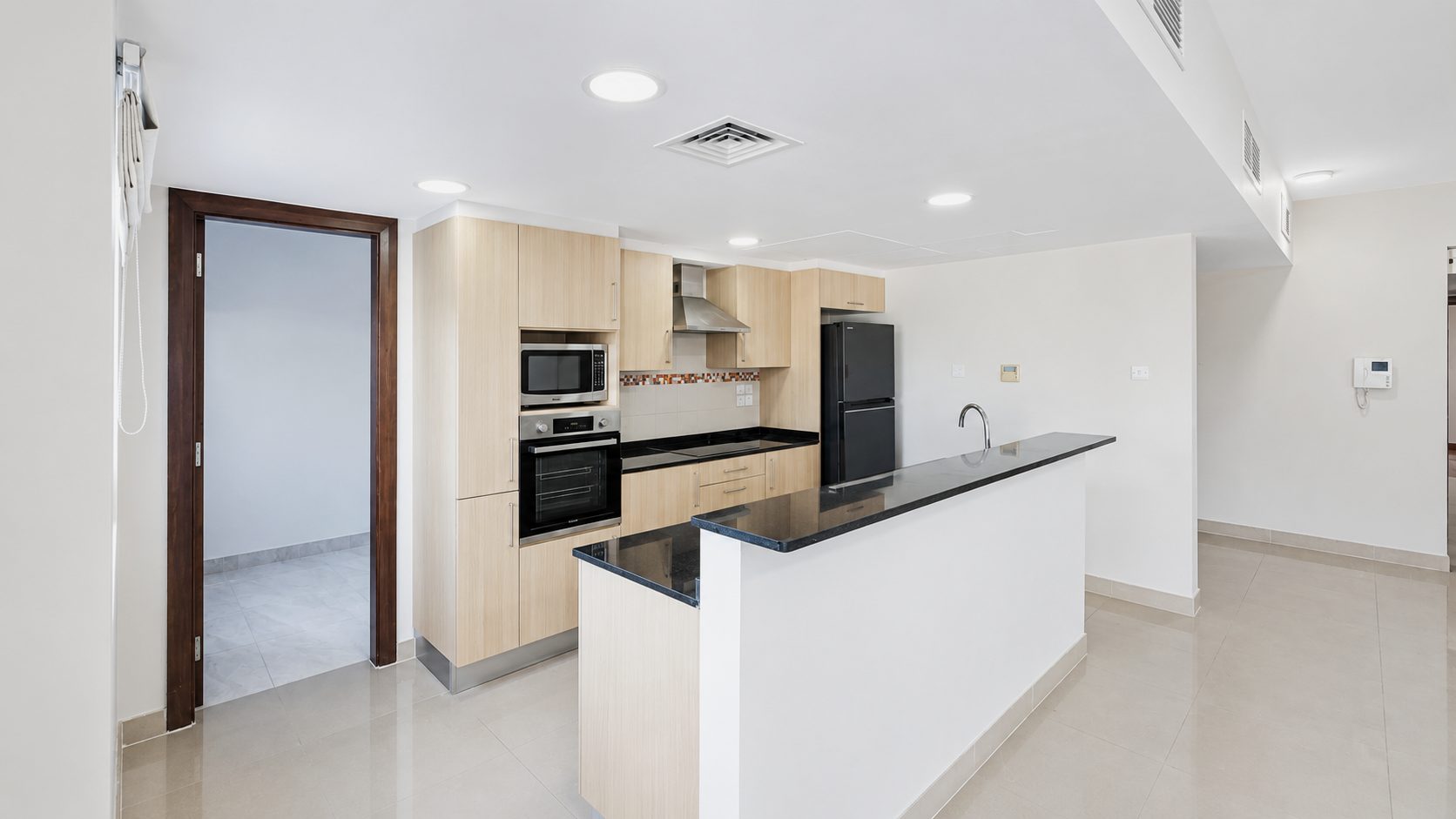 Three-Bedroom Apartment with Private Garden and Pool
