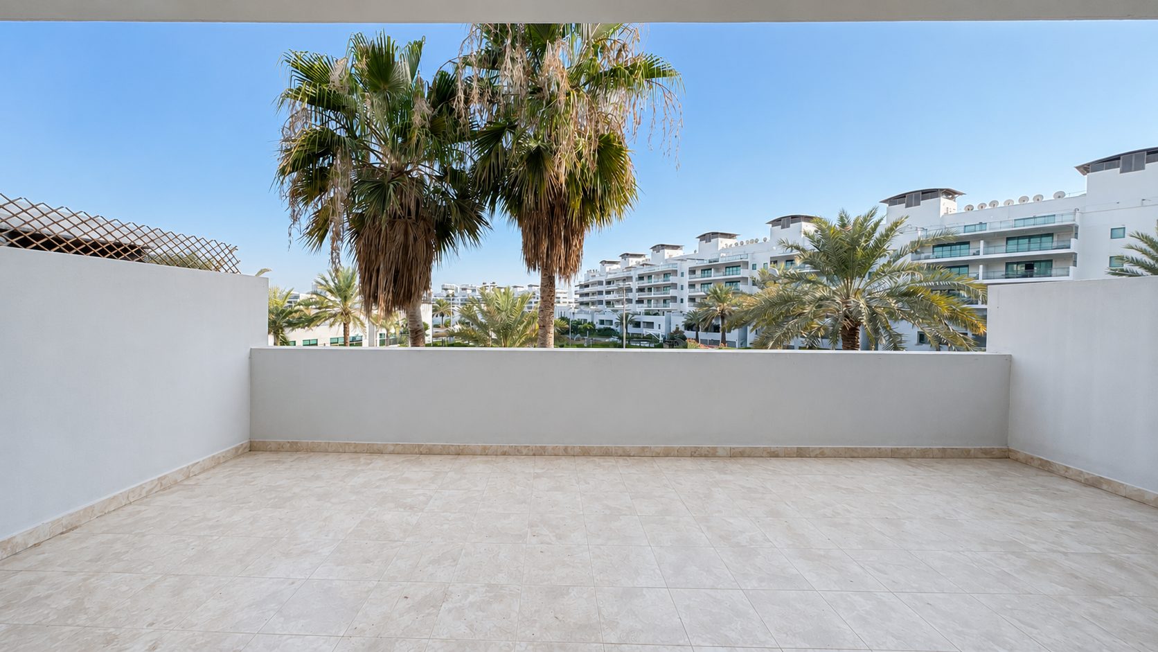 Three-Bedroom Apartment with Private Garden and Pool