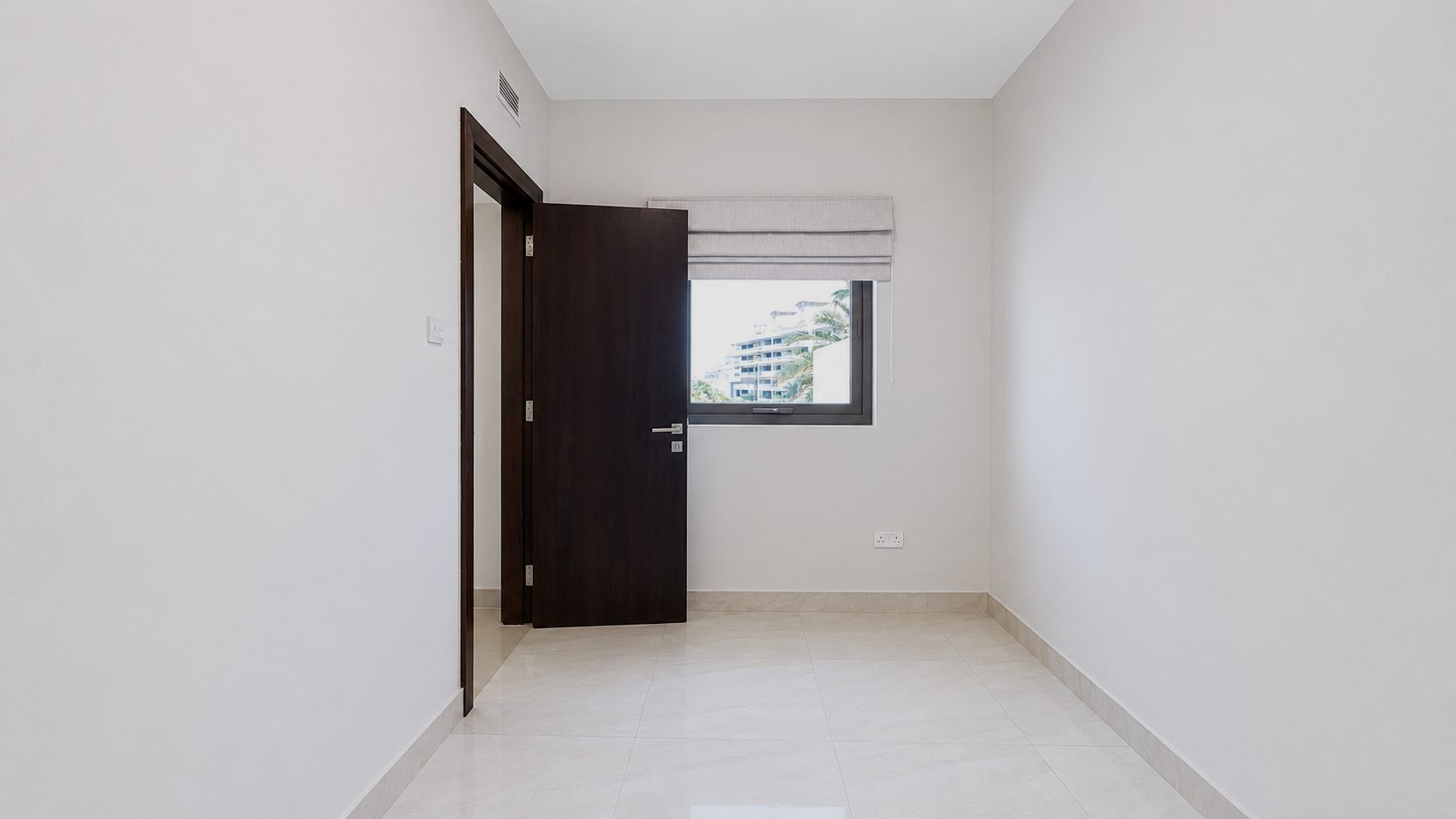 Three-Bedroom Apartment with Private Garden and Pool
